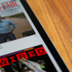 Tapping the tiny download icon allows you to view an issue offline but does not save that issue in an obvious place.